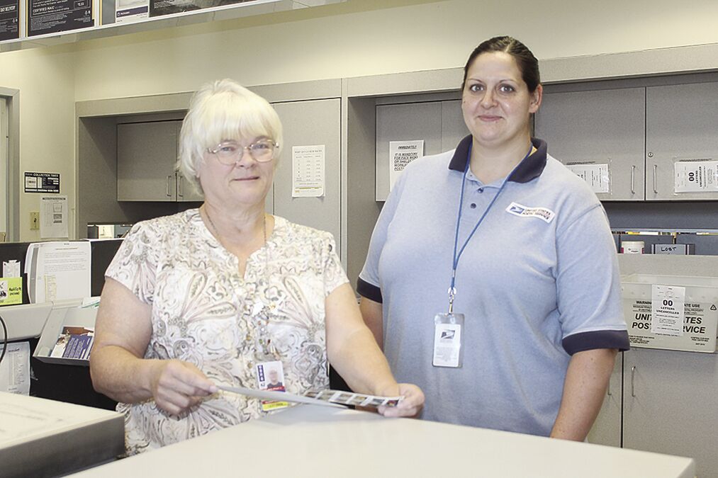 Stacey Willison, left, postmaster at the Union City Post Office